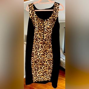 Torrid size 3 women’s dress with slimming cheetah panel.